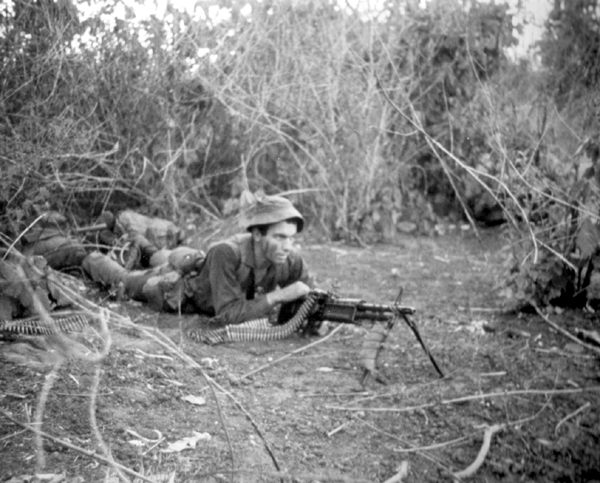 Soldier manning machine gun in Vietnam