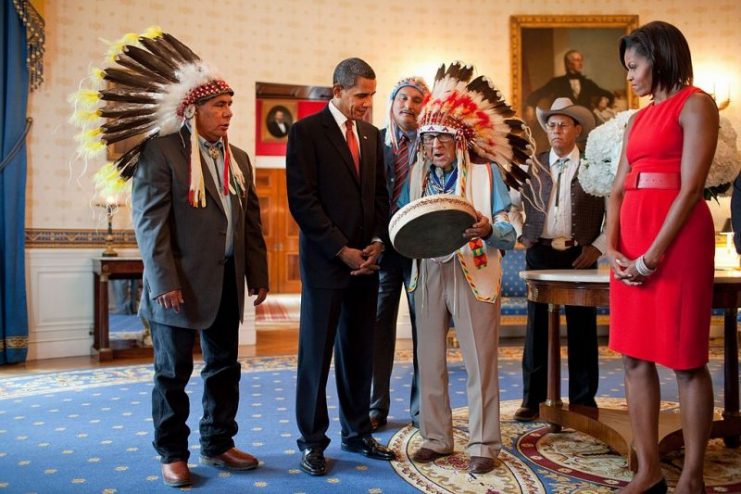 Barack Obama, Joe Medicine Crow, and Michelle Obama.