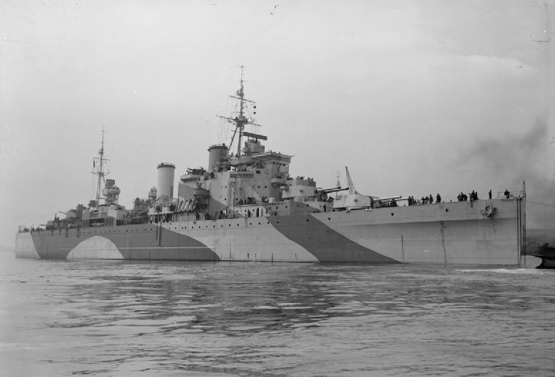 British heavy cruiser HMS LONDON under tow on the Tyne.