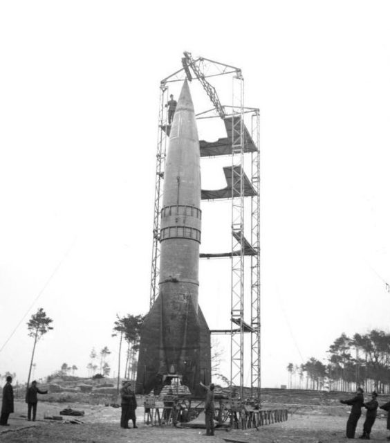 Peenemünde, rocket ramp with V2. By Bundesarchiv – CC BY-SA 3.0 de