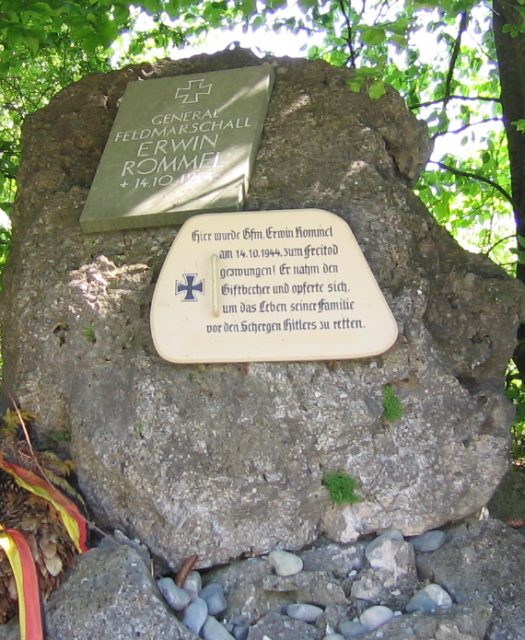 A memorial at the site of Field Marshall Erwin Rommel’s death outside of the town of Herrlingen, Baden-Württemberg, Germany (west of Ulm). Translation of the original text in German: “On this spot Field Marshal Erwin Rommel was forced to commit suicide on October 14th, 1944. He took the cup of poison and sacrificed himself, to save the lives of his family from Hitler’s henchmen.”