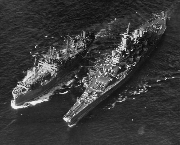 Fleet oiler of ServRon 6 refuelling Iowa-class battleship at sea, 1945