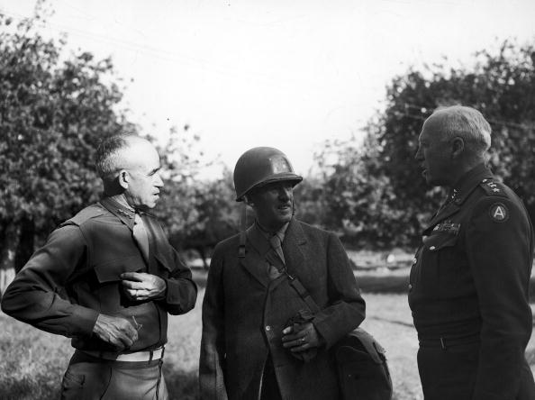 American Generals Omar Bradley (1893 – 1981) and George Patton (1885 – 1945) with Secretary of War Henry Stimson (1867 – 1950)