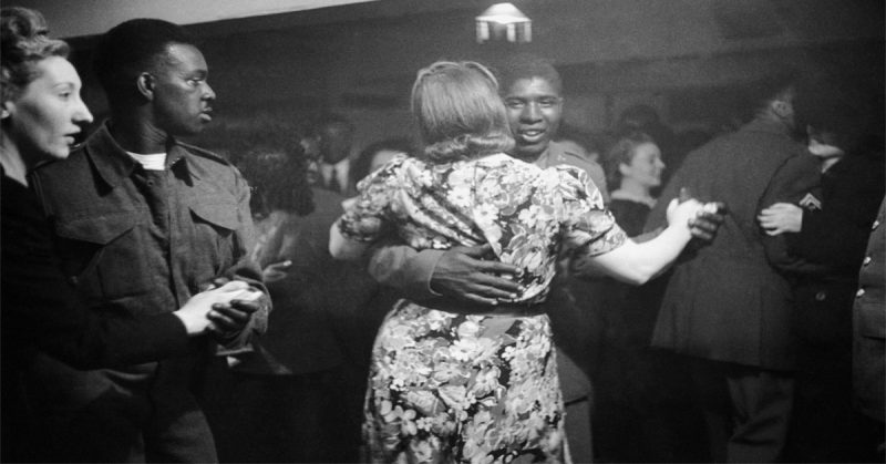 An African-American GI dancing with a white girl at the Bouillabaisse Club in London, 1943 (Photo by Felix Man/Picture Post/Hulton Archive/Getty Images)