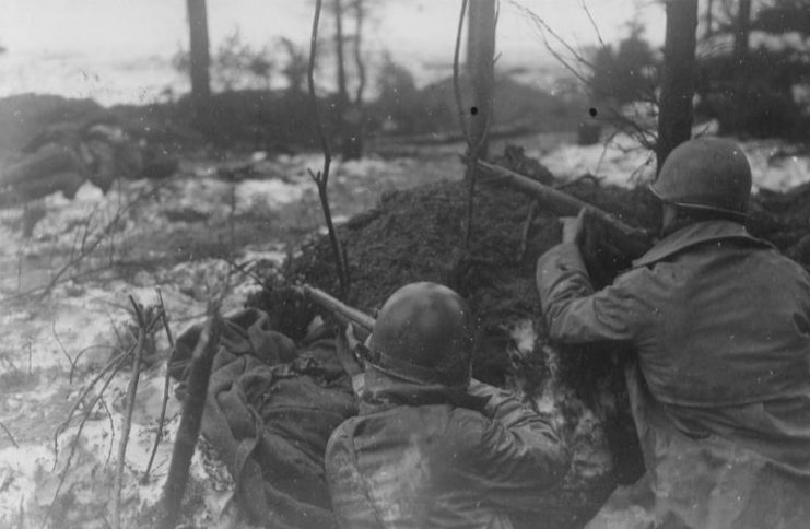 GIs of I Company, 394th Infantry Regiment 99th Infantry Division in position.