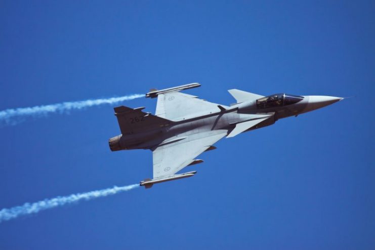 Swedish JAS 39 Gripen flying pass the spectators at Aero India 2017 at Bangalore in India.