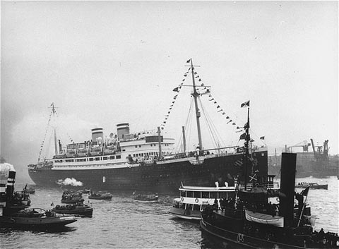 MS St. Louis surrounded by smaller vessels in its homeport of Hamburg
