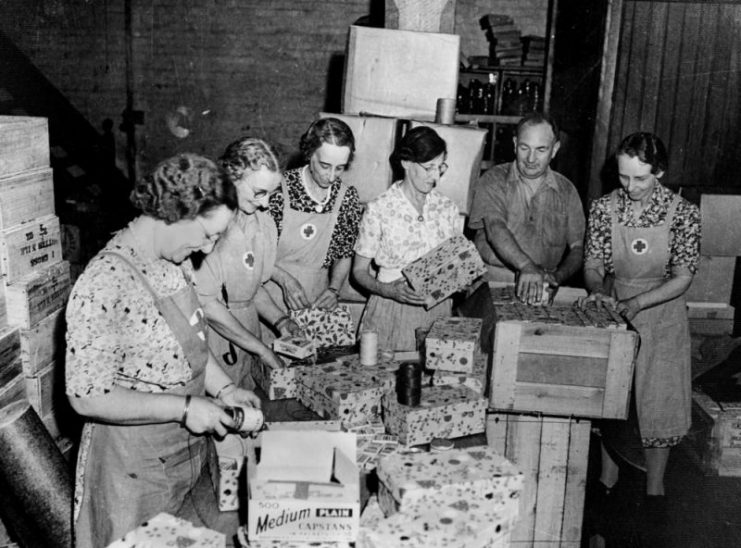 Red Cross workers packing Christmas presents for the Fighting Forces during World War II