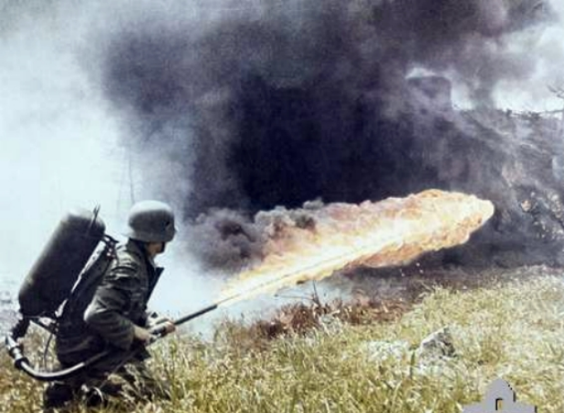 A German soldier using a flamethrower.