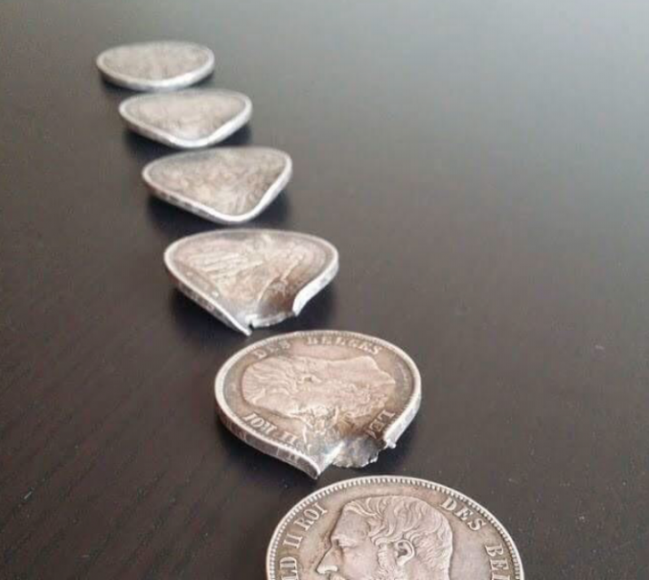 Belgian soldier Optatius Buyssens gave away his position to German troops when these coins began making a clinking noise in his pocket – but they also saved his life when their bullet ricocheted off them.Photo by Vincent Buyssens