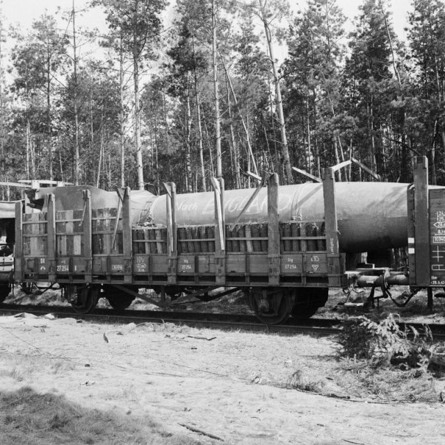A V2 rocket loaded on a railway truck at Leese in Germany ready for transport to the launch site.