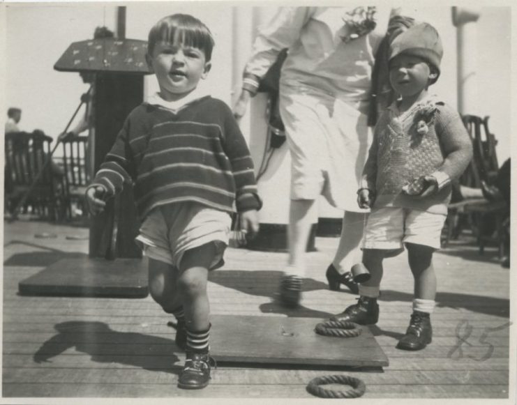 Two boys playing on St. Louis deck