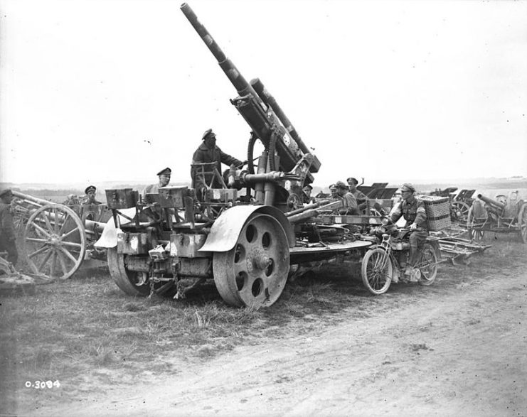 World War I Commonwealth troops with a captured, German 8.8 cm Flak 16 anti-aircraft cannon, August 1918