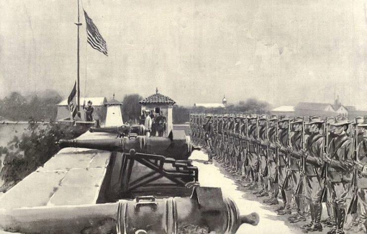 “Raising the American flag over Fort Santiago, Manila, on the evening of August 13, 1898.” drawing from Harper’s Pictorial History of the War with Spain.