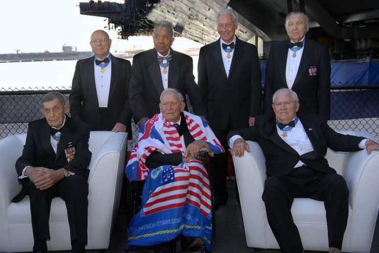 Retired Medal of Honor recipients (bottom left, U.S. Army 2nd Lt. Van T. Barfoot) pose together for guests prior to an awards ceremony held in the hangar bay aboard the USS Midway Museum in San Diego, Calif., May 24, 2008.