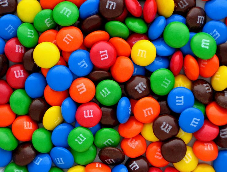 A pile of plain M&M’s candies.