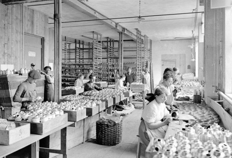 Women working in a gas mask factory in Geneva, Switzerland