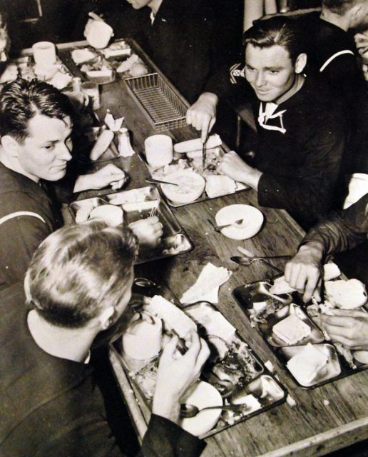 At “Chow”- corn-on-cob, steak, succotash, cake, ice cream, and “jamoke” (coffee), WWII. U.S. Navy Photograph. Courtesy of the Library of Congress.