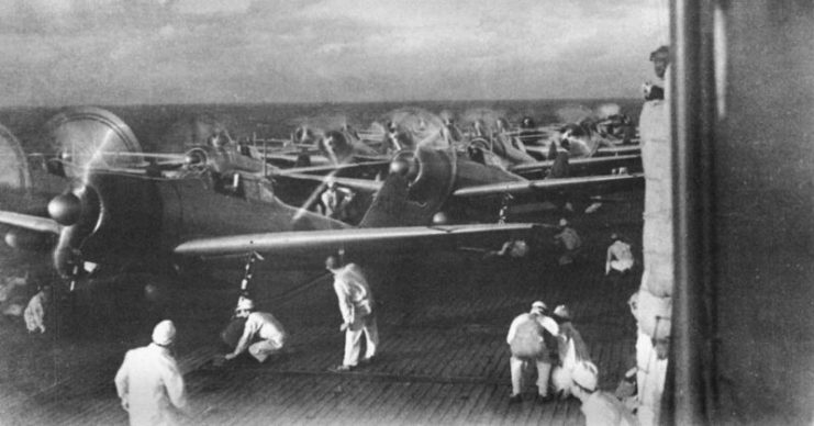 A6M2 Zero fighters prepare to launch from Akagi as part of the second wave during the attack on Pearl Harbor
