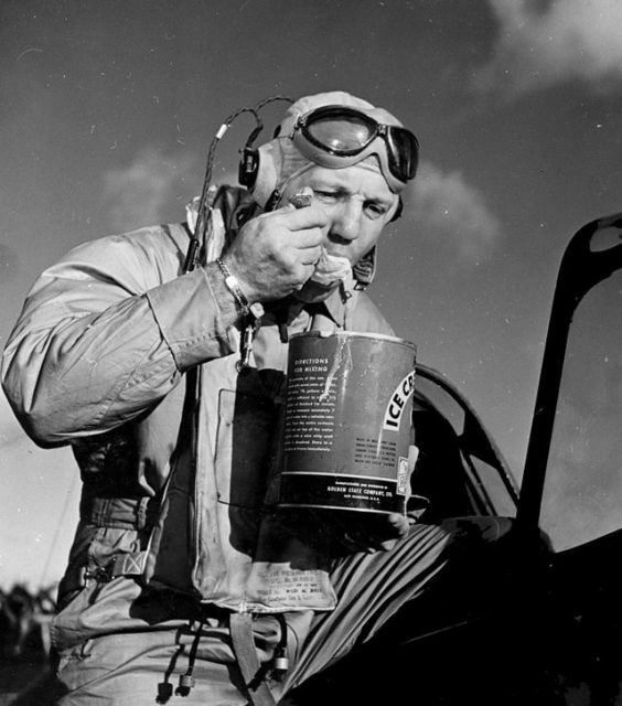 Commander Joseph C. Clifton eating ice-cream.