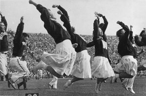 According to the 1957 Badger yearbook, the first women cheerleaders appeared on Dad’s Day, October 20, 1956. Photo: UW Digital Collections CC BY 2.0
