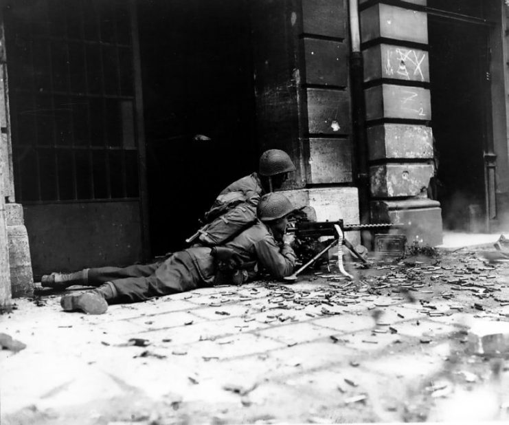 US soldiers fire a M1919A4