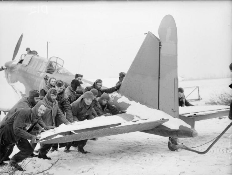 Ground crew pushing a Battle on the ground