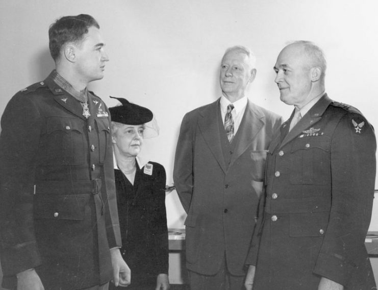 Gen. “Hap” Arnold presenting the Medal of Honor to Zeamer as his parents look on. (U.S. Air Force photo)