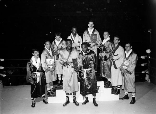 Portrait of the ten individual champions of the twenty-third NCAA boxing tournament held at the University of Wisconsin field house. Front left: Archie Milton. April 1960. Photo – wisconsinhistory.org