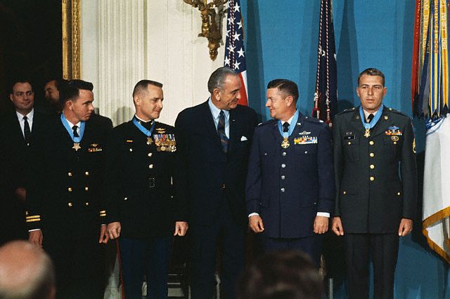 President Johnson (facing Lt. Col. Jackson) congratulates four Medal of Honor recipients at the White House on January 16, 1969.