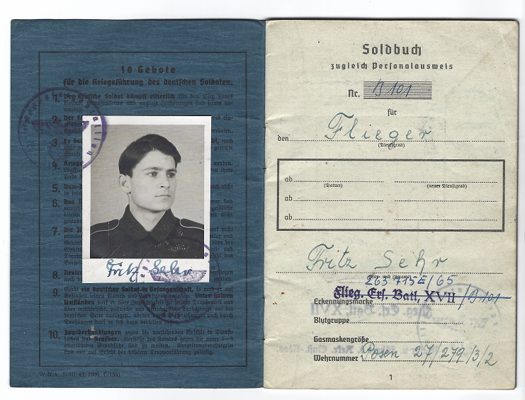 The inside of Soldbuch belonging to Fritz Sehr, an 18-year-old recruit in the German Paratroopers. The Soldbuch was the most important item on any German Soldier, as without it they could not prove their identity. Its need was created in order to keep a record of payments, but soon evolved into the main form of identification for German Soldiers and Officers. By 1943, the regulations for a picture to be added were passed. It also served as a record of the soldier’s service, units, medals, equipment and what weapons.