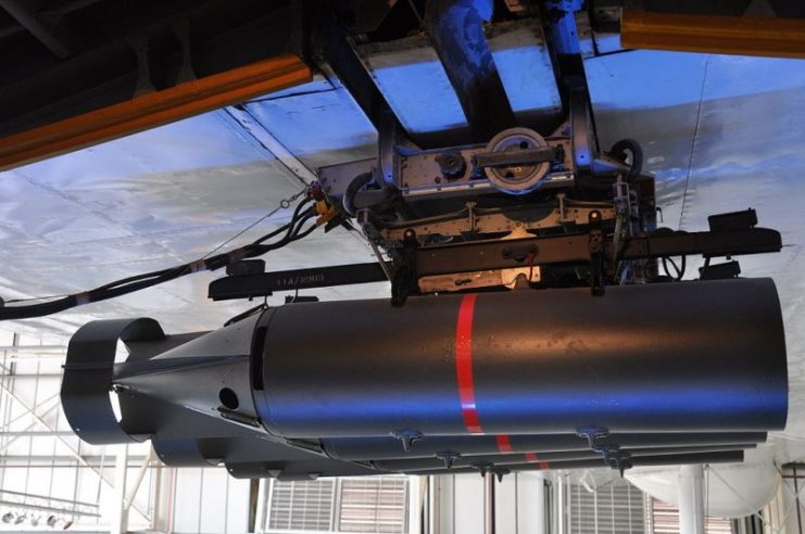 Depth bombs hang under the wings of an RAF Short Sunderland flying boat on display in the RAF Museum, Hendon