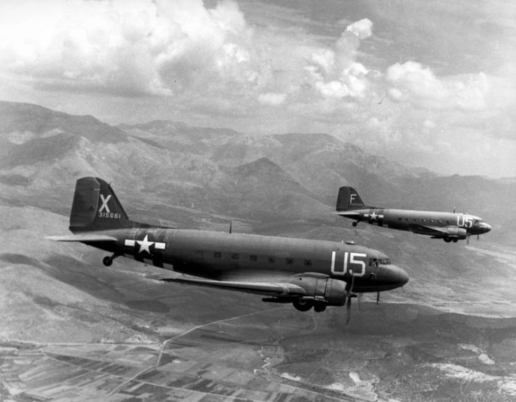 Two USAAF C-47A Skytrains (based on the Douglas DC-3) from the 81st Troop Carrier Squadron, loaded with paratroopers on their way for the invasion of southern France (Operation Dragoon).