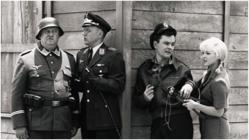 ast Of Hogan's Heroes: John Banner (Sgt. Hans Schultz), Werner Klemperer (Col. Wilhelm Klink), Bob Crane (Robert Hogan), and Cynthia Lynn as Klink's secretary, Helga in Hogan's Heroes TV series that ran from 1965-1971. Undated TV still. Photo by Getty Images