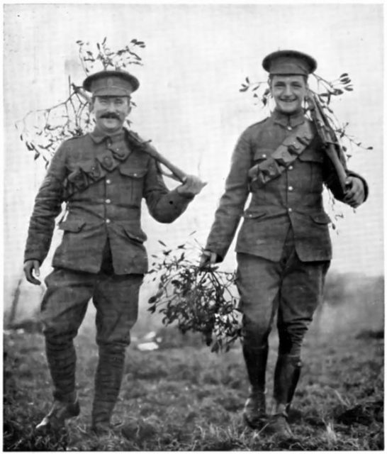 Christmas At The Front: British Soldiers Bringing In Mistletoe. The age difference is clearly visible.