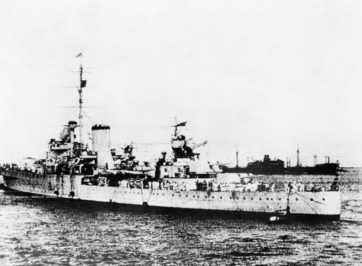 Rear Admiral Sir Henry Harwood Received in Montevideo. 3 January 1940, Montevideo, Uruguay. Admiral Harwood Arrived in the Cruiser HMS Ajax After the Battle of the River Plate and the Scuttling of the German Battleship Admirale Graf Spee. (radio Photograph?) The cruiser HMS AJAX at Montevideo. In the background is the TACOMA which acted as supply ship for the ADMIRAL GRAF SPEE, and which was interned.