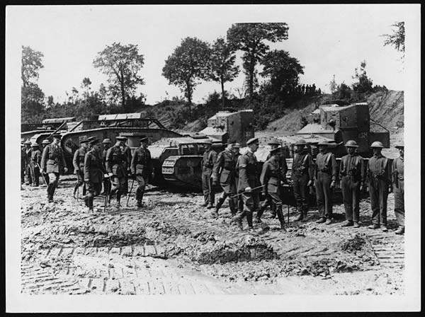 King George V visiting tank crews at the Front, in France, during World War I.