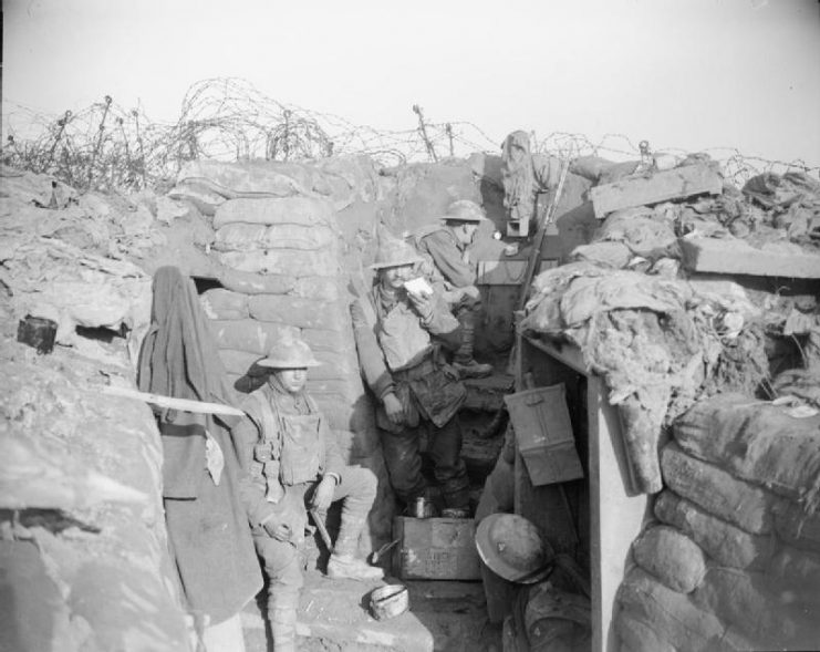 Members of the 4th Battalion, East Lancashire Regiment in trenches near Givenchy on 28 June 1918