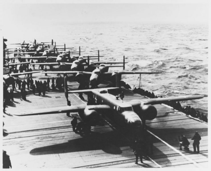 A Mitchell lines up as it prepares to take off to bomb the Japanese home islands, 18 April 1942. (U.S. Navy Photograph NH 53420, Naval History and Heritage Command)