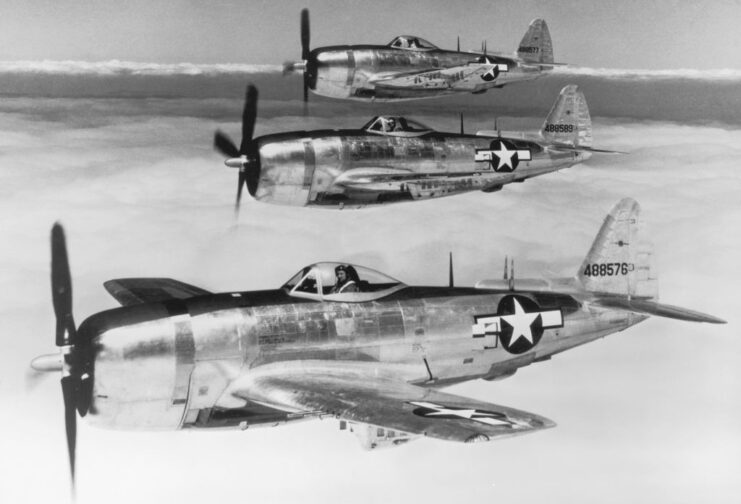Three Republic P-47 Thunderbolts in flight