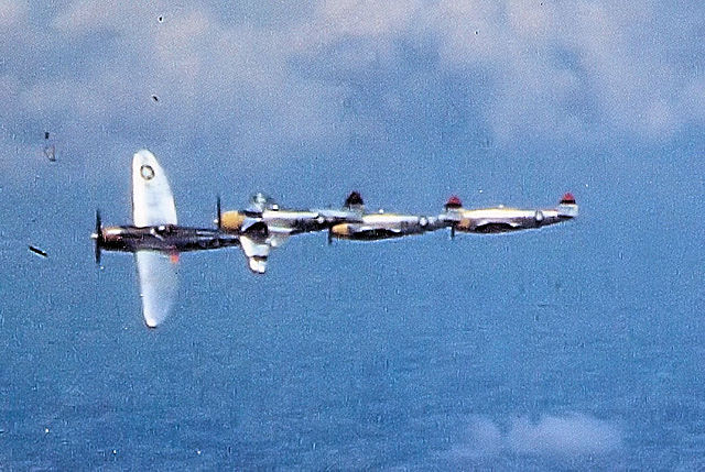 Four Republic P-47 Thunderbolts in flight