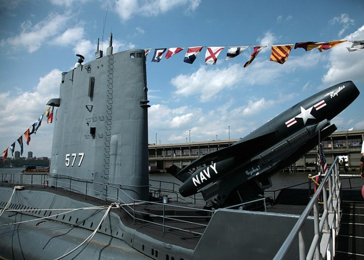 USS Growler, a Grayback-class submarine USS. Tied up next to USS Intrepid in New York in August 2006. A Regulus I surface to surface nuclear missile raised in a launch position.