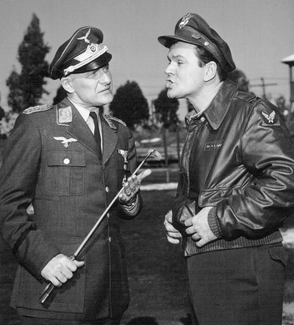 Photo of Werner Klemperer as Colonel Klink and Bob Crane as Colonel Hogan from Hogan’s Heroes.