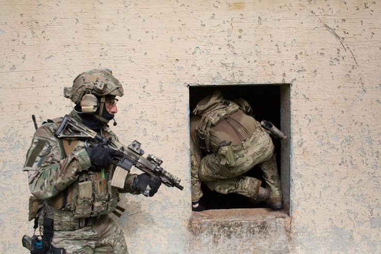 U.S. Army and Polish special operations forces conduct close-quarters combat training.