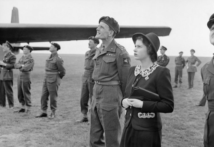 Princess Elizabeth watching parachutists dropping during a visit to airborne forces in England in the run-up to D-Day.