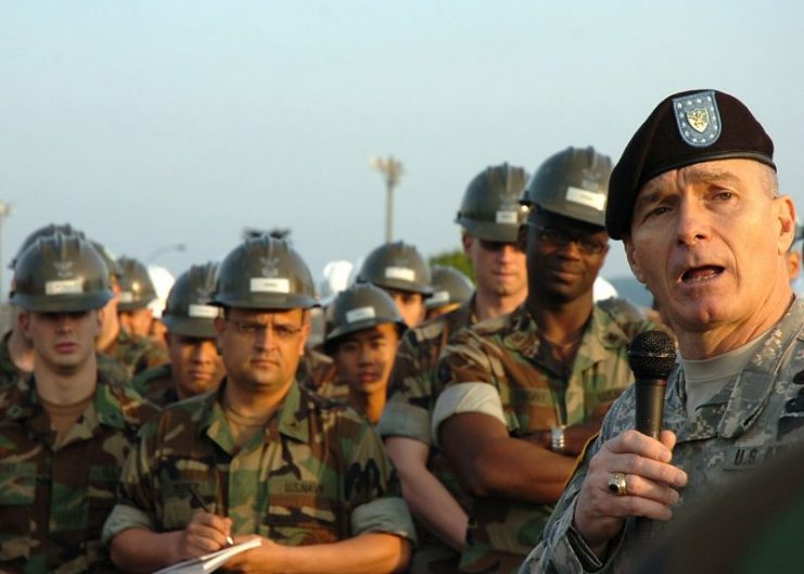 Seabees from Naval Mobile Construction Battalion (NMCB) 3 listen to Army Sgt. Maj. William J. Gainey in 2007, Okinawa, Japan