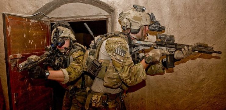Rangers (75th Ranger Regiment) clearing a room during a night raid in Helmand Prov. Afghanistan