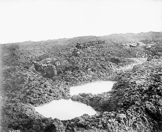 A Canadian machine gun company holding the line in muddy conditions.