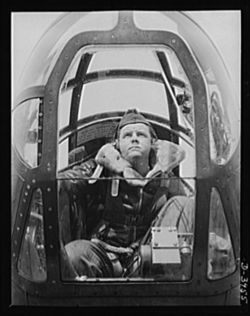 An American bombardier in training at Fort Benning, Georgia makes accurate hits with practice bombs that will later be exchanged for the real “eggs for war.”