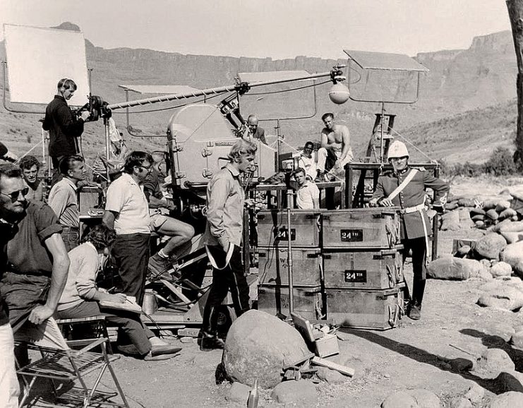 Behind the scenes on the location set of the film Zulu with stars Michael Caine and Stanley Baker.
